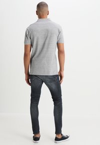 Scotch & Soda Vaqueros pitillo - grey denim