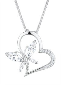 Ciondolo a forma di cuore in argento con una libellula decorata con pietre preziose trasparenti su una collana a catena in argento.