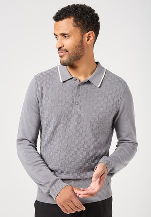 Gray long-sleeve polo shirt featuring a textured checkered design, ribbed collar with contrasting trim, and button placket.