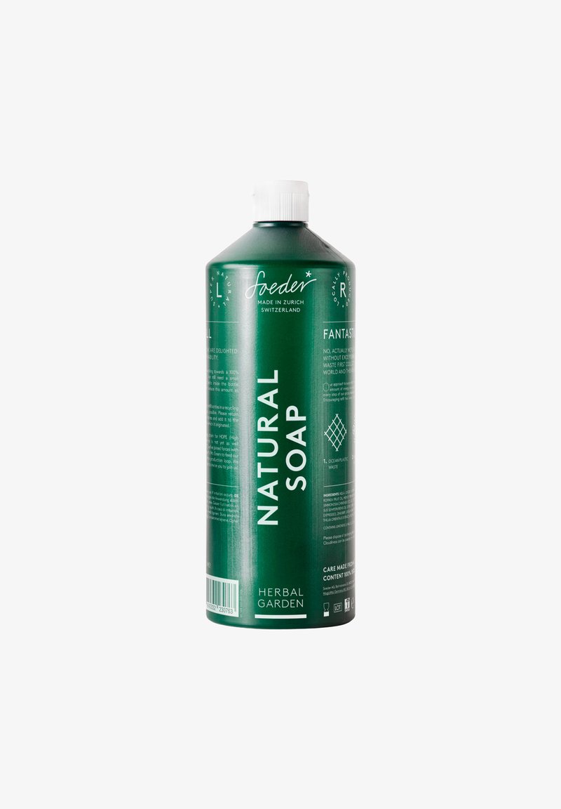 Bottiglia di plastica verde contenente sapone naturale, con testo bianco e un tappo, dalla texture liscia e design minimalista. L'etichetta include informazioni sul prodotto.