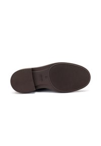 Suola di scarpa in gomma marrone con grip testurizzato e bordi lisci e arrotondati. Presenta un tacco arrotondato e una stampa del marchio al centro.