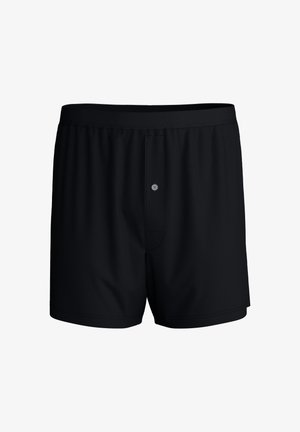 Zwarte katoenen boxershorts met een knoopsluiting aan de voorkant, een elastische tailleband en een gladde textuur, zonder patronen of extra hardware.