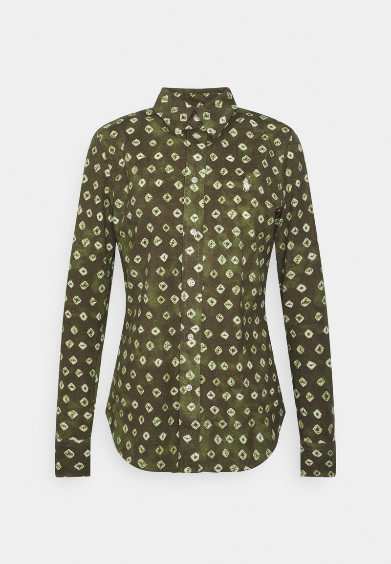 Grön mönstrad skjorta med knappar och vita diamantformer, lång ärm, spetsig krage och knäppning fram.
