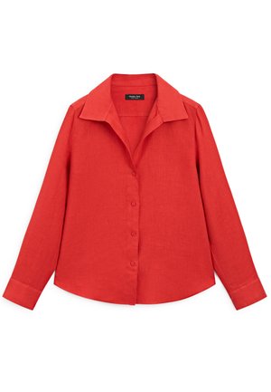Red linen blouse with a pointed collar, long sleeves, and a button-down front. Smooth texture and regular fit with curved hem.