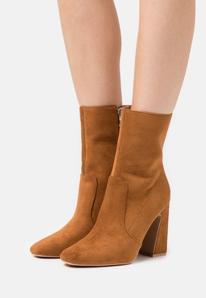 RAID, Bottines à talons hauts - tan