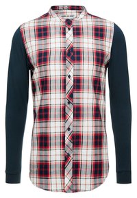 Camicia a maniche lunghe con bottoni, con un motivo a quadri rosso, blu navale e grigio sul davanti; maniche blu navale uniformi; colletto rotondo; chiusura frontale con bottoni.