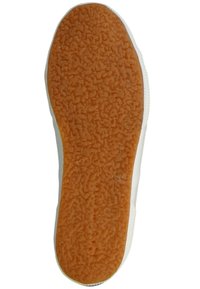 Semelle de chaussure en caoutchouc avec une surface texturée orange. Le bord présente un matériau blanc, mettant en valeur un design épuré et minimaliste avec une forme arrondie.