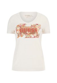 Bílý organický bavlněný T-shirt s výstřihem do V, s květinovým vzorem a zlatým nápisem "GUESS" na přední straně. Krátké rukávy, klasický střih.