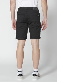 Koroshi BERMUDA STRETCH REGULAR COLORS BERMUDA STRET - Jeansshorts - black