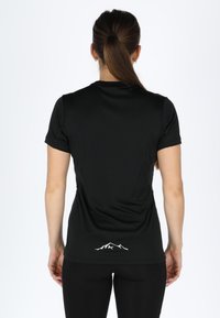 Black athletic t-shirt made of smooth, stretchy fabric, featuring short sleeves and a white mountain logo at the back near the hem.