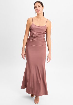 Ruinous pink maxi dress with thin straps, fitted bodice, and flowing skirt. Smooth texture with gathering details at the sides.