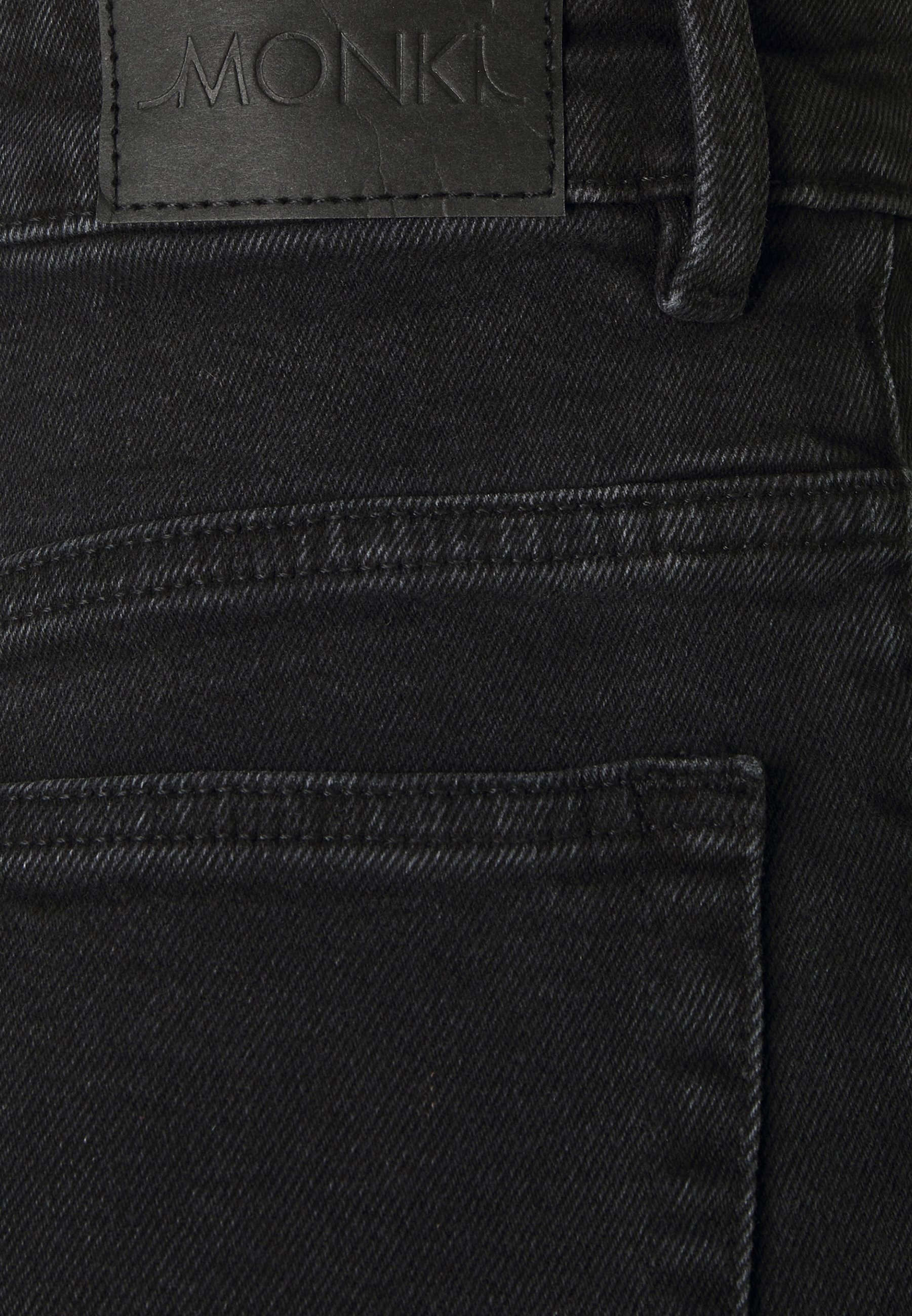Monki KAORI - Relaxed fit jeans - black 