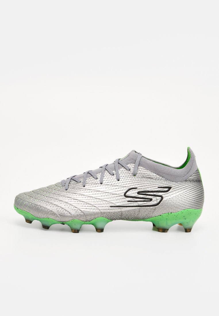 Botines de fútbol para terreno firme