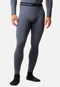 Gray thermal leggings with a fitted design and elastic waistband featuring the text "SWEDEMOUNT." Made from a smooth, stretchable material.