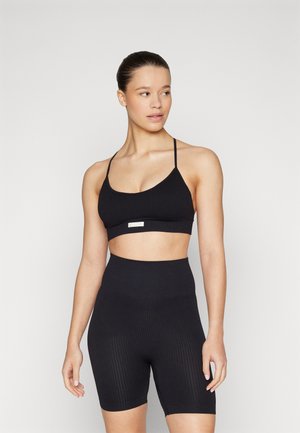 STUDIO SEAMLESS STRAP BRA - Light support sports bra - black beauty