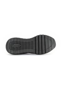 Black rubber shoe sole with horizontal grooves, textured surface, and a circular logo embossed in the center.