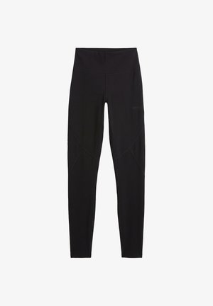 Fekete, magas derekú, teljes hosszúságú leggings varrási részletekkel a lábak mentén, atlétikai vagy hétköznapi viseletre tervezve.