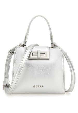 Silver metallic Guess handbag with top handle, front turn-lock closure, and adjustable shoulder strap.
