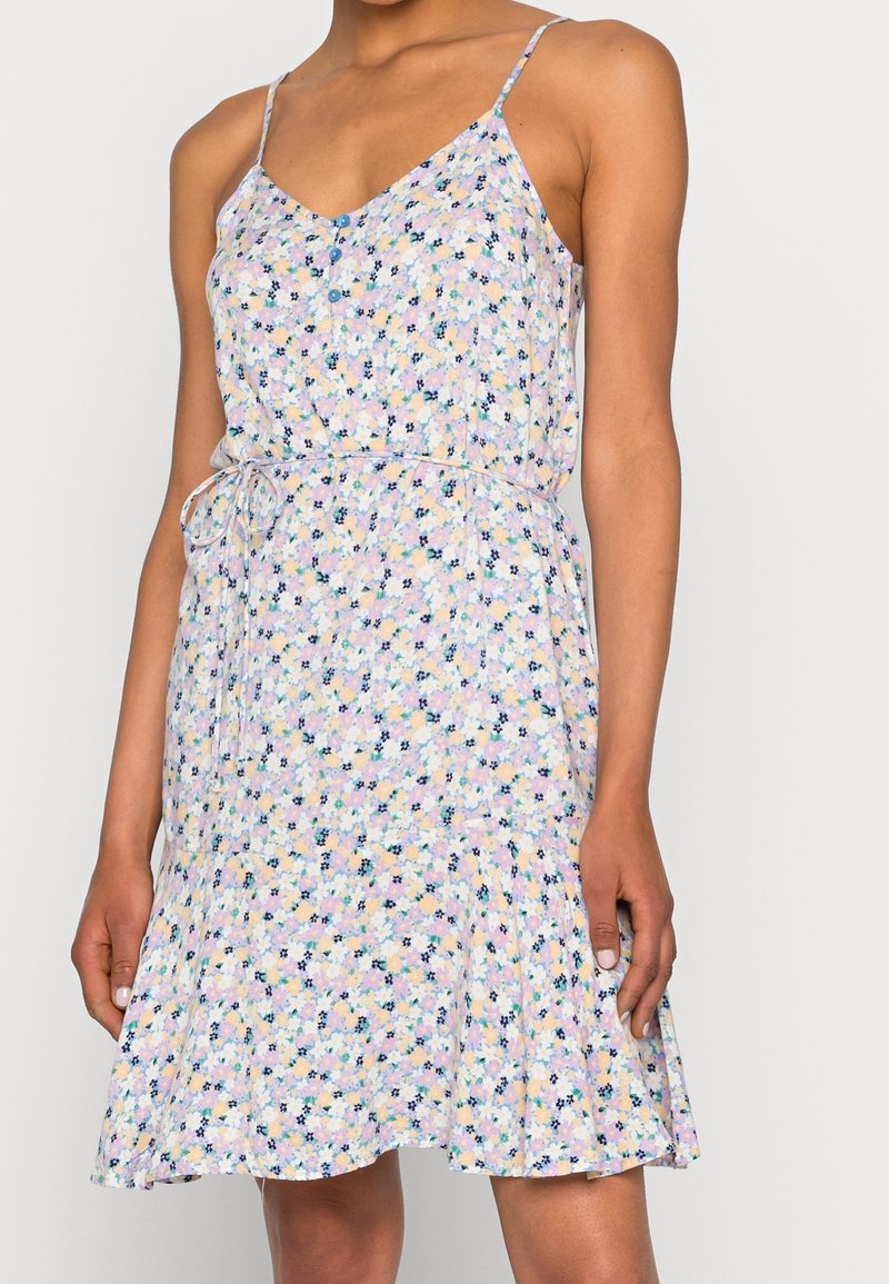 Vestito con stampa floreale in tessuto leggero, con scollatura a V, spalline regolabili, vita elastica e orlo svasato.