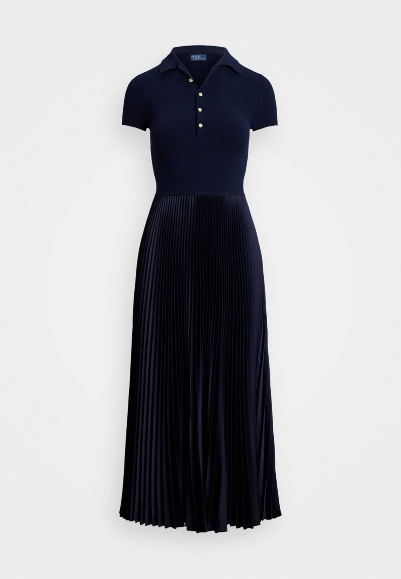 Ναυτικό πλισέ φόρεμα με τοπ σε στυλ polo με κοντά μανίκια, που έχει γιακά και τρεις κουμπιά, που μεταβαίνει σε μια ρέουσα πλισέ φούστα.