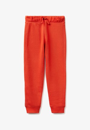 Pantalones deportivos de color naranja brillante con cintura elástica, cordón ajustable y puños acanalados en los tobillos, mostrados planos sobre fondo blanco.