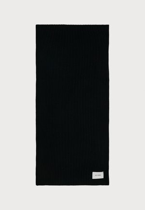 Black ribbed scarf made of soft fabric, featuring a small white tag with the brand name at one end. Rectangular shape and textured design.
