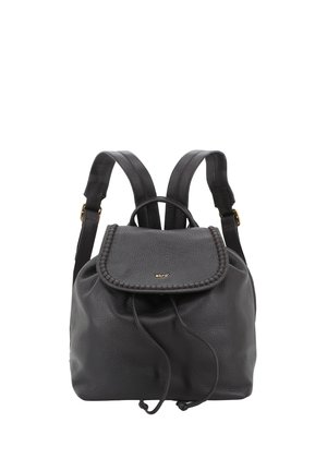 Black leather backpack with braided flap, drawstring closure, adjustable shoulder straps, and small gold logo on the front.