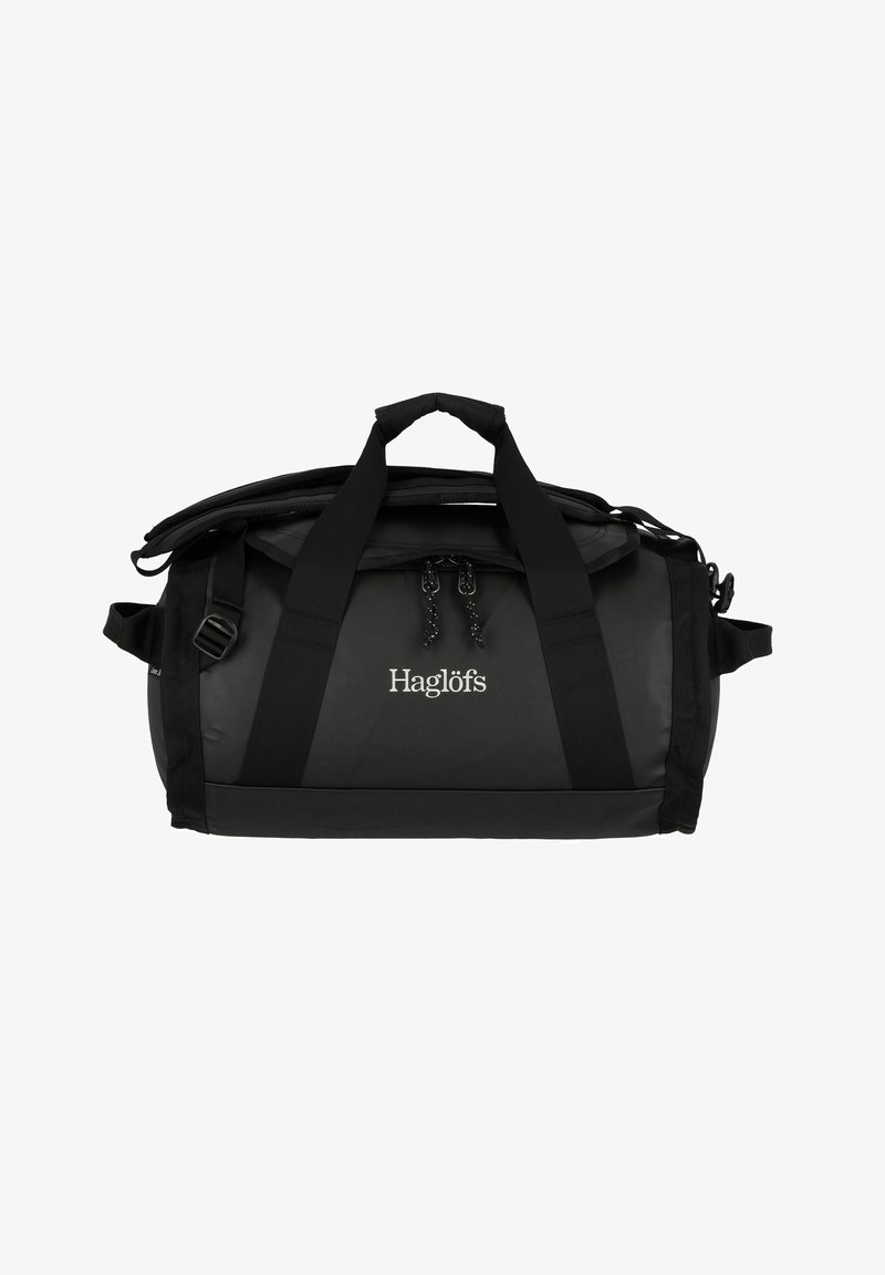Borsa duffel nera realizzata in materiale resistente, dotata di due manici per il trasporto, una tracolla e una chiusura a zip. Logo del marchio visibile.