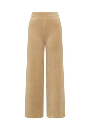 Beżowe spodnie o szerokich nogawkach z prążkowanego materiału, z elastycznym paskiem w talii oraz małym okrągłym metalicznym logo blisko pasa.