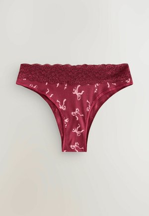 Bordeauxfärgad trosa med spetskant och en slät yta, prydd med ett upprepande mönster av rosa snörningar över hela tyget.
