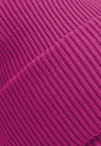 Purple ribbed knit fabric with a textured, vertical pattern. The surface features alternating raised and flat lines, creating depth.