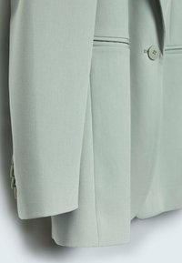 Stradivarius Halflange jas - khaki