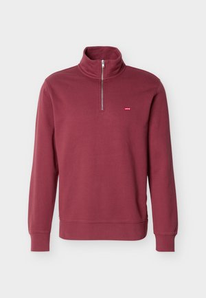 Sudadera granate con cremallera hasta un cuarto, cuello alto, mangas largas, puños acanalados y pequeño logo rojo de Levi's en el pecho izquierdo.