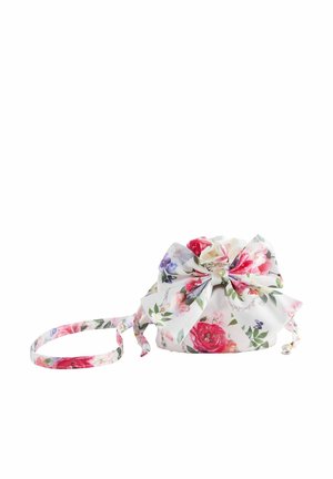 Floral drawstring bag made of fabric with pink and purple flower patterns, featuring a prominent bow closure and thin strap.