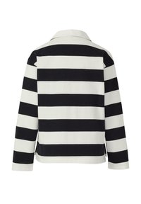 Gestreept shirt met lange mouwen in zwart en wit, met een kraag, een rechte zoom en zijsplitten voor extra bewegingsvrijheid.