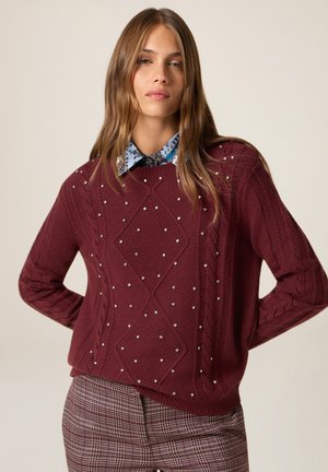 - Sweter