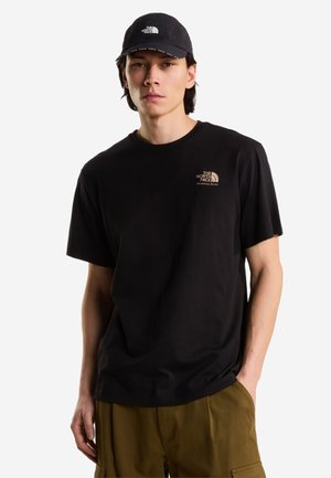The North Face, U OG STORE RLX SS TEE-GRAPHIC. UNISEX - T-shirt print - tnf black