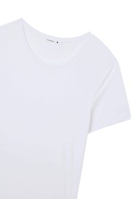 T-shirt bianco a maniche corte con scollo rotondo. Realizzato in morbido cotone, presenta una piccola etichetta del marchio all'interno nella parte posteriore.
