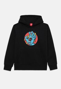 Black hoodie with a front pocket. Features a blue, graphic hand emerging with an open mouth against a red circular background.