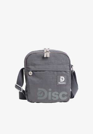 Compact gray crossbody bag with front zipper pocket, adjustable strap, and "Discovery" logo on front.