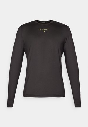Mustmust värviga pikkade varrukatega särk siledast kangast, ümar kaelus, fluoresseerses kollases "HYROX" logo ning sale lõige.