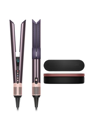 Hair straightener with digital display, control buttons, ventilation grilles, and two compact black and rose gold storage cases.