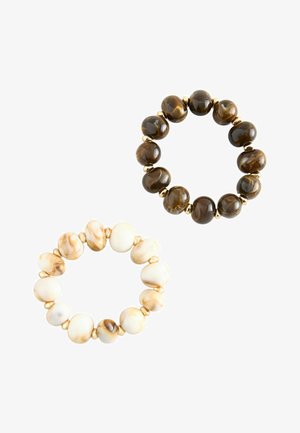 Two beaded stretch bracelets, one with polished brown marbled beads and the other with polished beige marbled beads, separated by small gold-tone spacers.