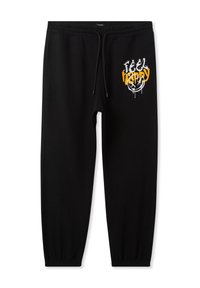 Pantaloni sportivi neri con cintura elastica, cordino regolabile e grafica "FEEL HAPPY" in bianco e giallo sulla coscia sinistra.