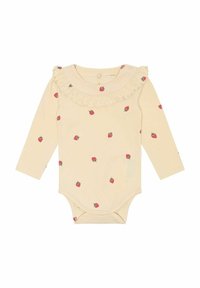 Garās piedurknes krēma bodijs ar ruffles apkakli, ar izkaisītu zemeņu apdruku. Izgatavots no mīkstas kokvilnas, apakšā ir spiedpogas.