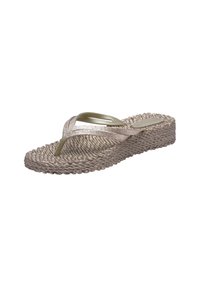 Korkosandaali, jossa on punottu jute-tyylinen pohja, kultaiset kimaltelevat hihnat ja tyylikäs varvastuki. Väri: vaaleanbeige metallisilla yksityiskohdilla.