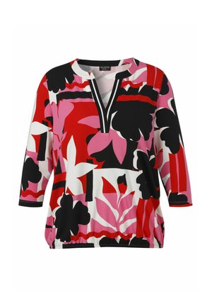 Blouse femme à manches trois-quarts, col en V et ourlet élastique, avec un motif floral audacieux en rouge, noir, rose et blanc.