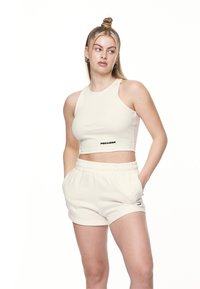 Pegador AYLA CROP - Felső - washed coconut milk/black