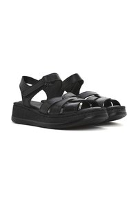Zwarte sandaalschoenen met een wiggle voetbed, gestructureerde leren banden, open teen ontwerp en verstelbare enkelbandjes.