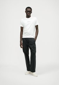 Hollister Co. BAGGY HEAVY WEIGHT - Armijas stila bikses - black